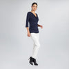 Top con escote drapeado