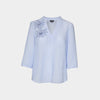 Blusa con flores bordadas