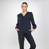 Blusa de pliegues