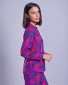Blusa estampada con colgantes metálicos