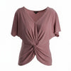 Blusa de manga corta con nudo frontal
