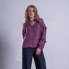 Blusa berenjena de polka dots