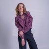 Blusa berenjena de polka dots