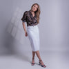 Blusa estampada con hebilla lateral
