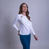 Blusa con broche metálico