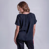 Blusa de manga corta y cordones en el cuello