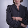 Blusa con estoperoles