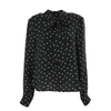 Blusa de lunares con lazo al cuello