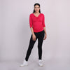 Top con escote drapeado